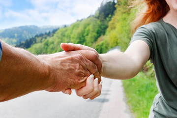 Man and woman shaking hands. Symbol of friendship
