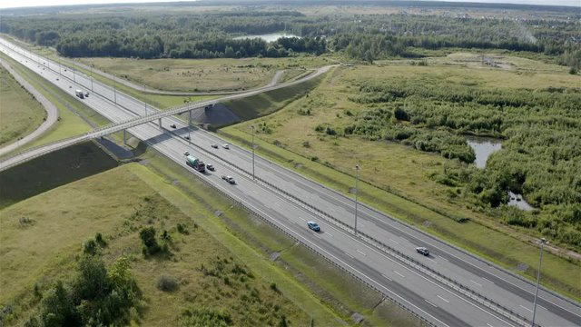 a bridge over the road leads to freshwater lakes.
