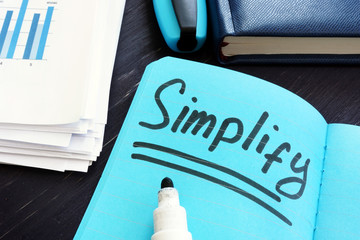Simplify written on a page. Simplicity concept.