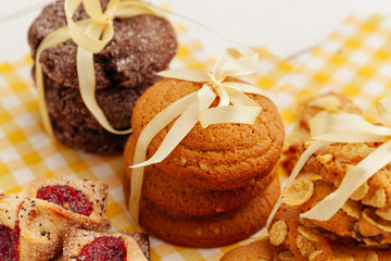 Stack of crunchy tasty cookies on a kitchen table close up