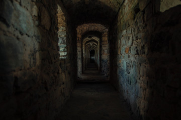 dark scary dark corridor underground path way of ancient fortress 