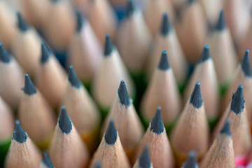 Close up front image of stacked pencils tip.shallow focus effect..