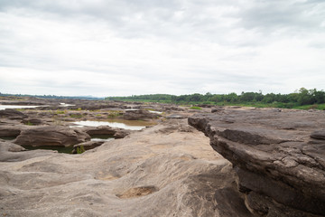 River Island. Rocks from water erosion. 
