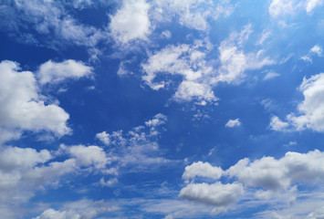 Naklejka na ściany i meble Stratocumulus white clouds in the blue sky natural background beautiful nature 