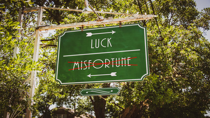 Street Sign to Luck versus Misfortune
