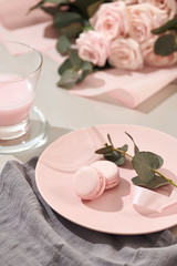 White background with pink and white objects