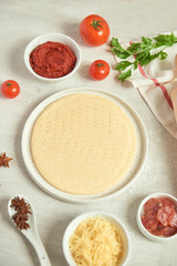 Preparing individual pizzas from pizza bar