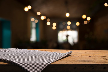 red tablecloth on wooden background empty deck