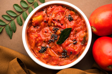 Tomato/tamatar chutney or sauce, served in a bowl. selective focus
