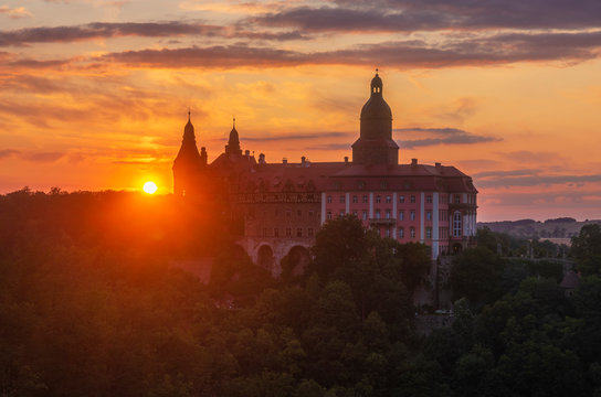 Ksiaz castle illuminated with the light of the rising sun.Książ Castle, Wałbrzych, Lower Silesia, Poland