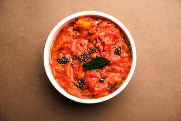 Tomato/tamatar chutney or sauce, served in a bowl. selective focus