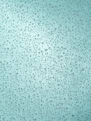 Raindrops on glass car texture.