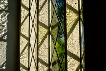 Reflections of Stained Windows on a Church interior
