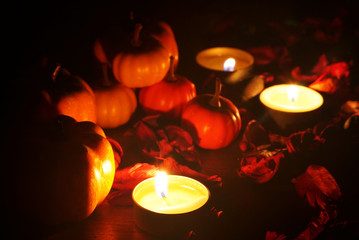Pumpkin decorate with candles for halloween night party.