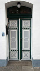 Beautiful art wooden vintage door in the street of old town, Lubeck, Germany