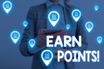Handwriting text writing Earn Points. Conceptual photo collecting scores in order qualify to win big prize Woman wear formal work suit presenting presentation using smart device