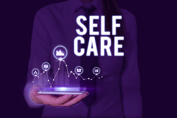 Text sign showing Self Care. Business photo text the practice of taking action to improve one s is...
