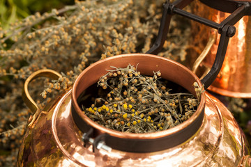 Alembic is a distilling apparatus of Arabic origin which may be used to distill essential oils and...