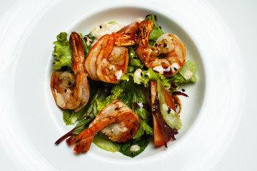 prawn shrimp salad on a white plate
