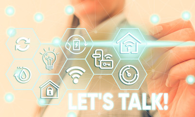 Conceptual hand writing showing Let S Talk. Concept meaning they are suggesting beginning...