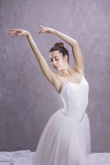 Fototapeta na wymiar Medium shot ballerina with arms floating