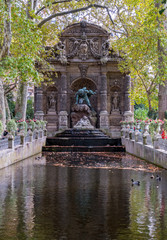 Fototapeta na wymiar Paris, France: Medici Fountain in Luxembourg Gardens. It was built about 1630 by sculptor Francesco Bordoni (1580-1654), under Marie de' Medici order.