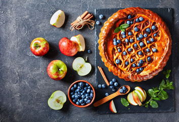 Apple Blueberry Pie on a black slate tray