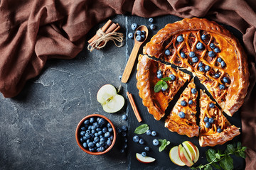 delicious sliced Apple Blueberry Pie, flat lay