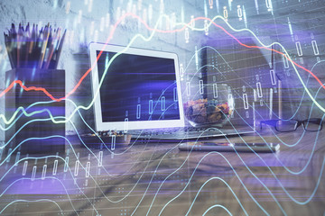 Double exposure of forex chart and work space with computer. Concept of international online trading.