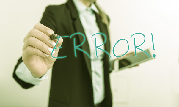 Writing note showing Error. Business concept for state or condition of being wrong in conduct judgement or program Digital business in black suite concept with business woman