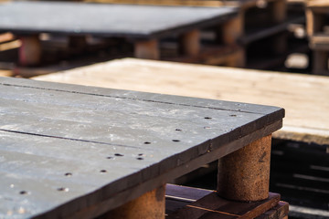 Outdoor furniture made of wooden palettes in cafe