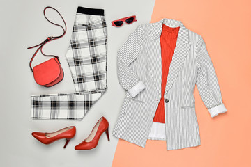 Autumn Arrives. Fashion Lady Clothes fall Outfit. Trendy jacket, trousers. Stylish red Handbag,...