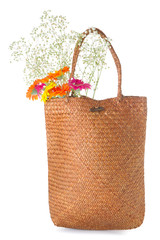 Stylish eco bag with fresh flowers on white background