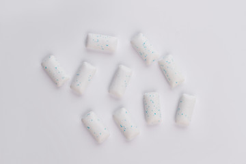 Chewing gums on white background. Sugar coated chewing gums for teeth health.