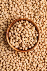 Bowl on many raw chickpea