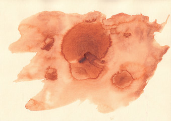 Brown gradient watercolor stain on textured watercolor white paper while maintaining the surface paper. A beautiful large spot with transitions of transparency and color saturation
