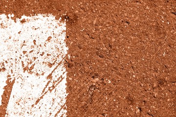 Old dirty asphalt surface with white paint on it brown color toned