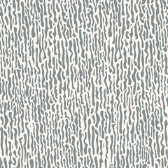 Stylish vector seamless pattern with small chaotic gray figures on white backdrop. Seamless abstract pattern. Grunge abstract wallpaper. Broken figures pattern.