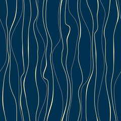 Wavy line pattern. Yellow vertical wavy lines on blue background. Strips similar to threads. Hand drawn stripes. 