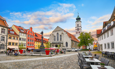 Bavaria Lindau Germany. Square old town with authentic traditional house tower from church and paving stones. Picturesque panorama landscape landmark. - obrazy, fototapety, plakaty