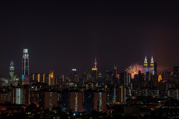 Fototapeta na wymiar KUALA LUMPUR, MALAYSIA - 31st AUGUST 2019; The Kuala Lumpur skyline glittered with a kaleidoscope of colours and spectacular lights and sound to mark the nation’s 62 years of independence of Malaysia.