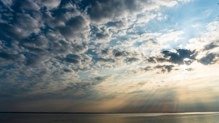 rays of sunset on the seashore