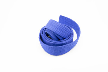 Blue karate belt on white background