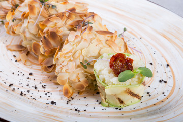 Chicken baled with almonds and quinoa