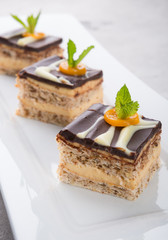 Three pieces of chocolate cakes decorated with mint