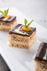 Three pieces of chocolate cakes decorated with mint