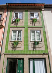 Green Tiled Apartment With Four Windows in Braga, Portugal