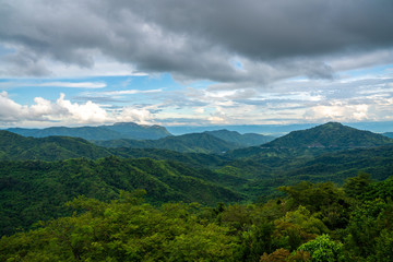 beautiful blue sky high peak mountains mist fog wildlife green forest at  Phu Tub Berk Khao Koh Phetchabun Thailand guiding idea long weekend for backpacker camping campfire relaxing hiking