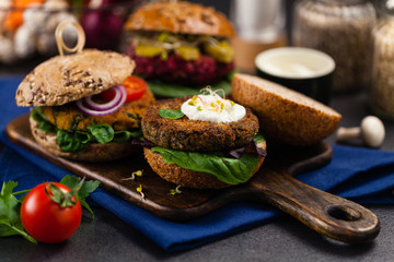 Vege burgers with carrots, beetroots and mushrooms.