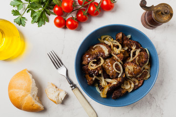 Fried chicken liver with onions.